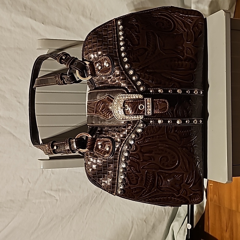 MC embossed leather shoulder bag